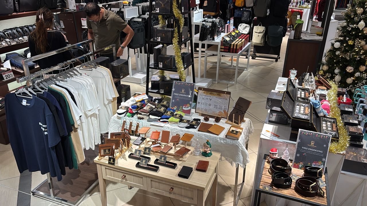 The Everyday Men booth at Isetan KLCC, surrounded by other men's accessories brands